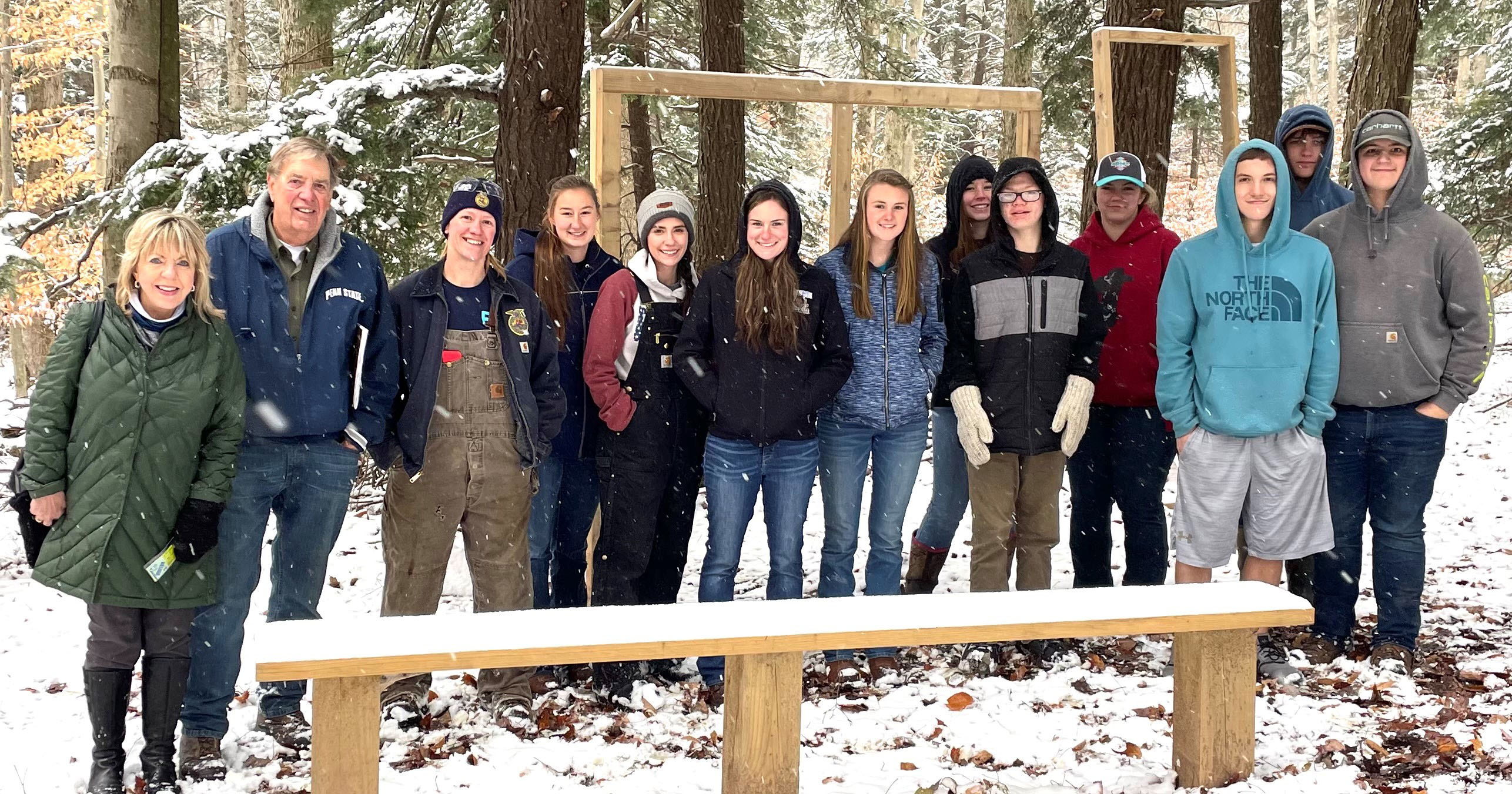 Connie and Sandy Wolfinger (left) visit with students from the Northern Potter School District's agriculture education class.